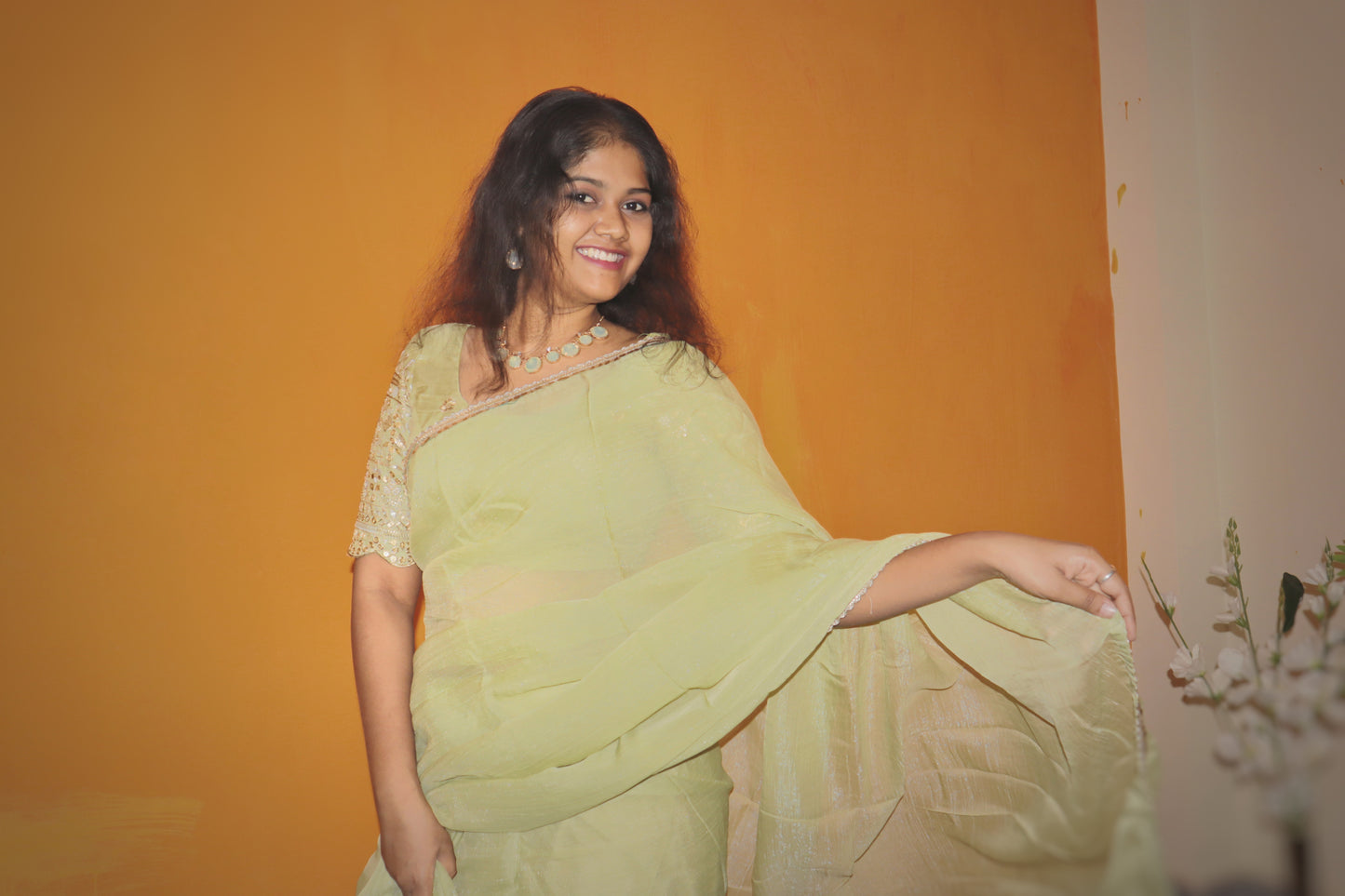 "Elegant crushed pista green saree with worked blouse