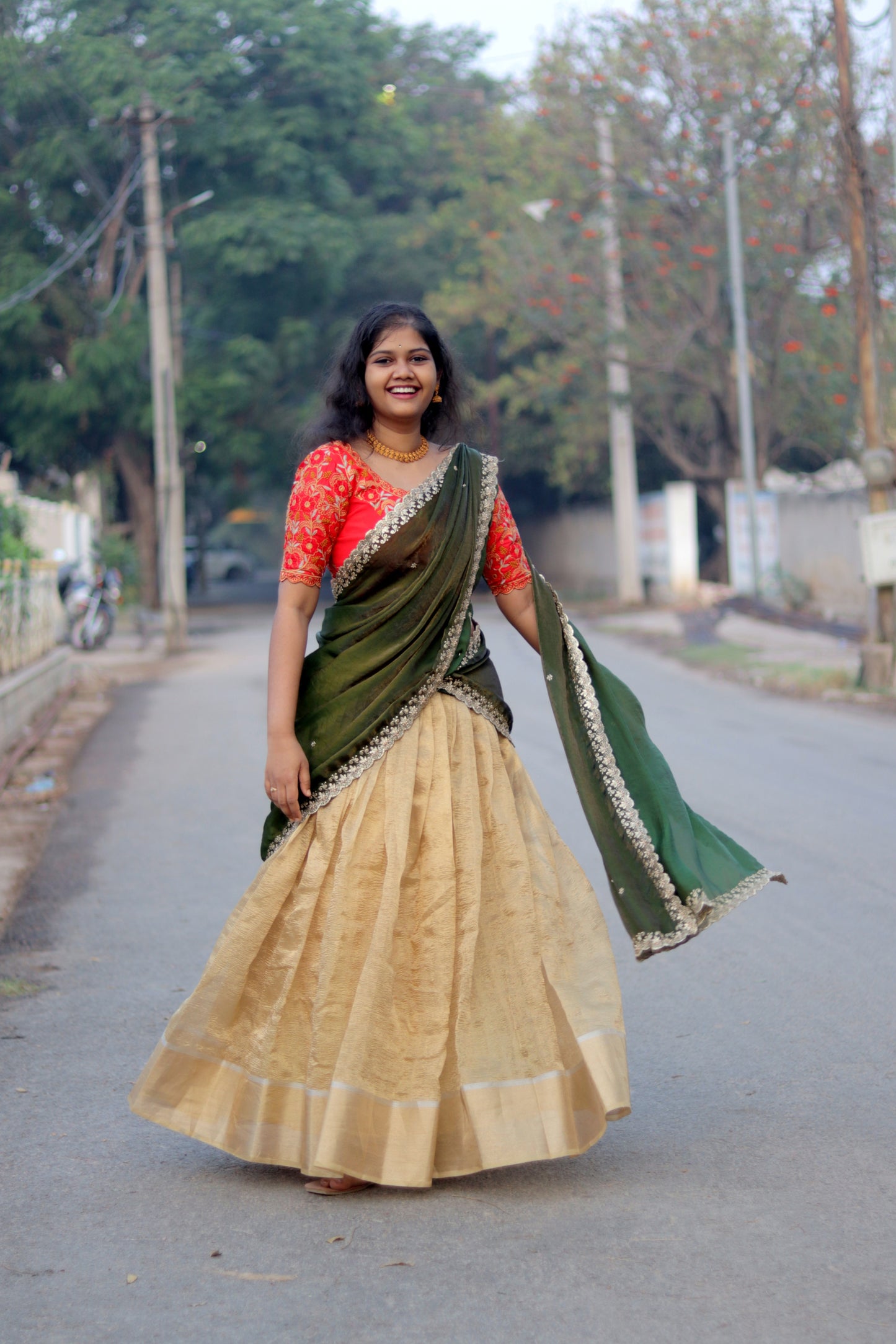 Elegant Golden Lehenga with Green Dupatta & Red Embroidered Blouse