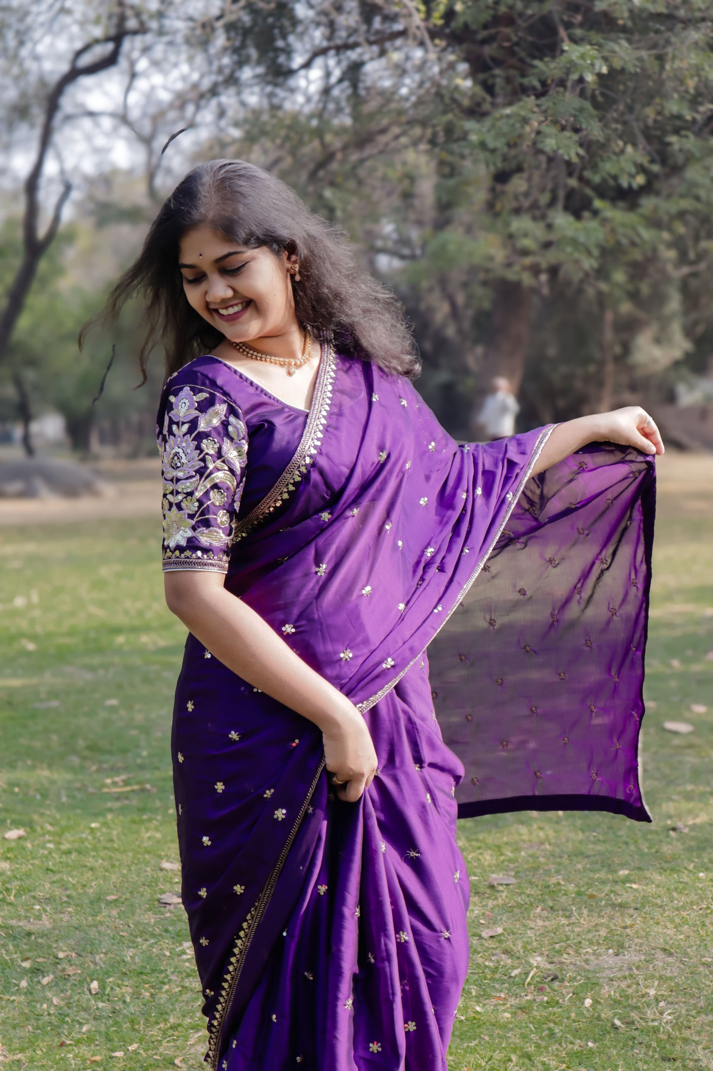 "Majestic Purple Georgette Saree with Exquisite Golden Lace Work"