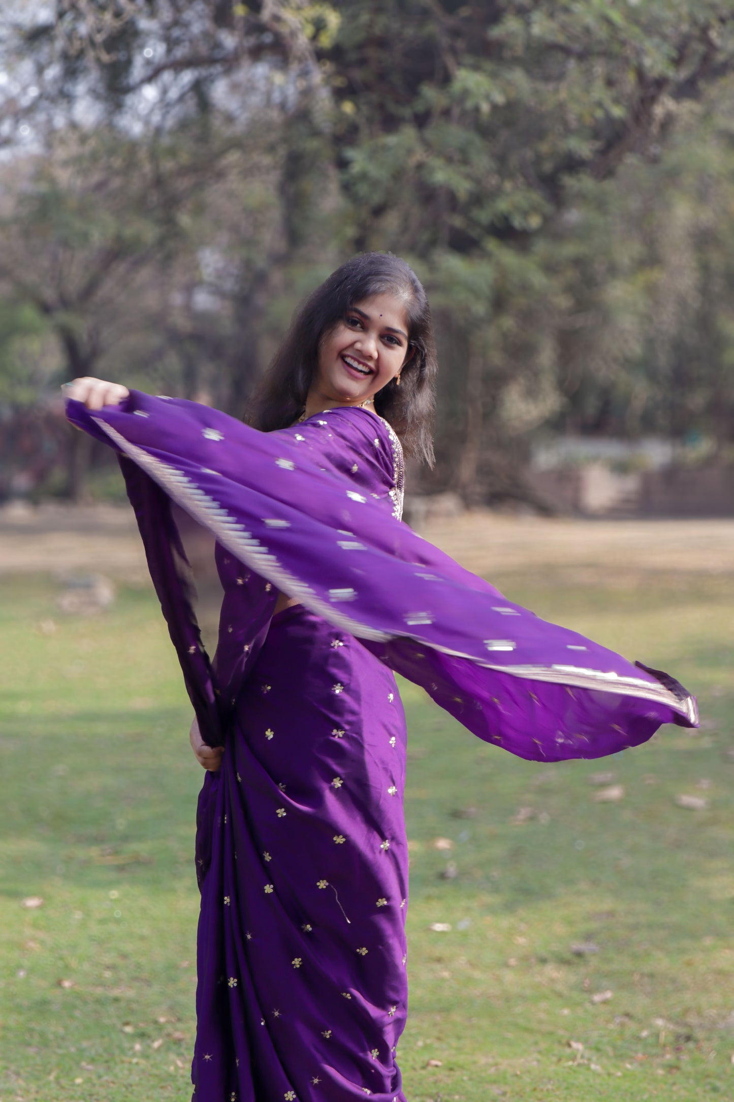 "Majestic Purple Georgette Saree with Exquisite Golden Lace Work"